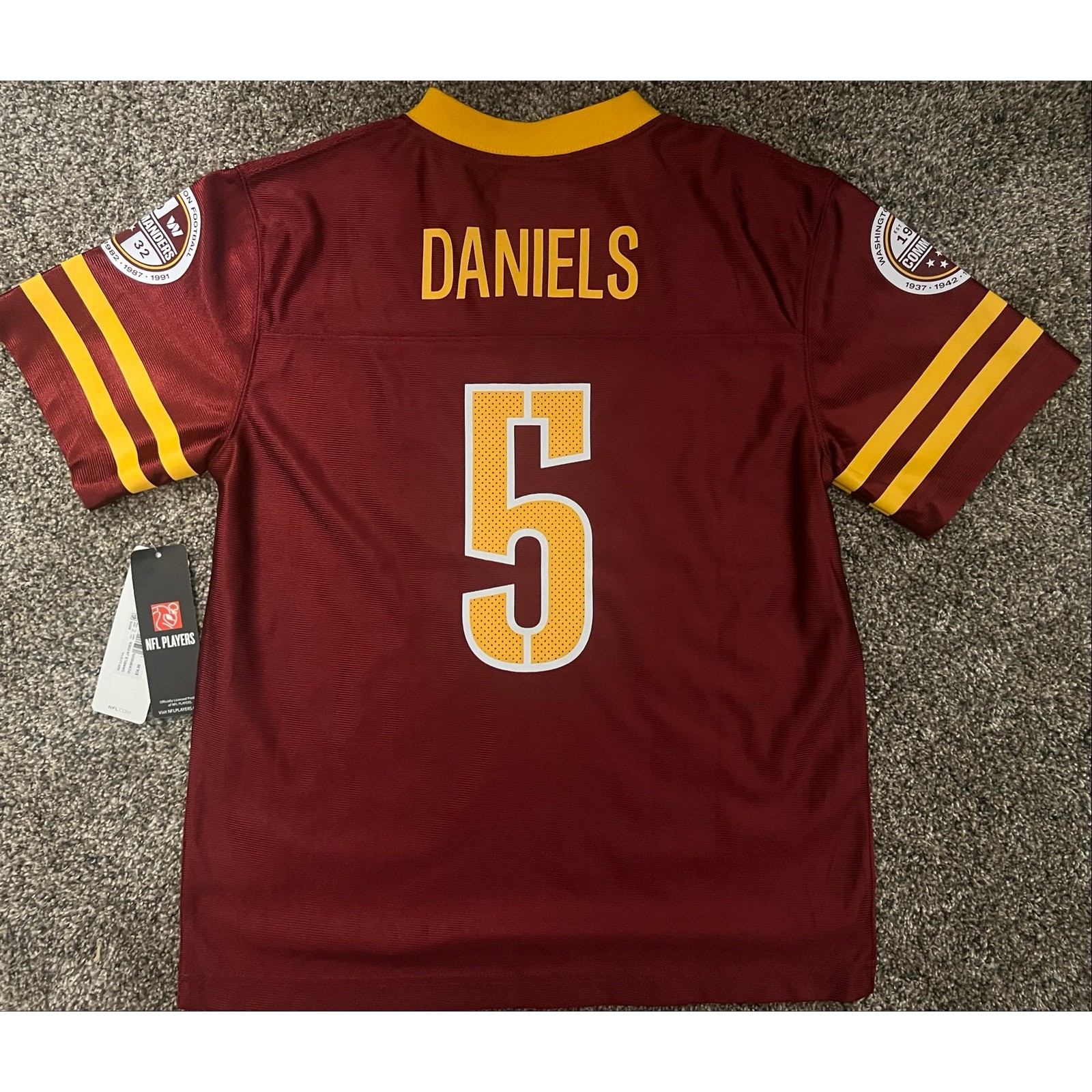 NFL Youth Large (12/14) Washington Commanders #5 Jayden Daniels Jersey