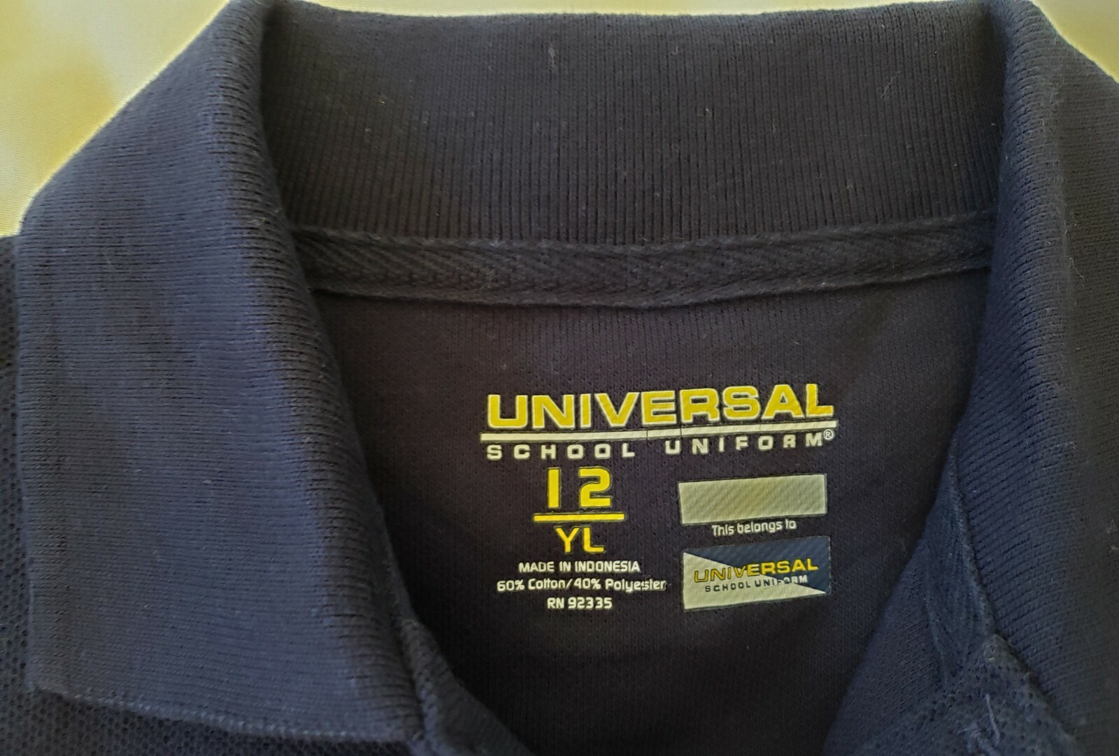 UNIVERSAL SCHOOL BLUE SHORT SLEEVE POLO BOYS SHIRT SIZE #12 YL – A9/16