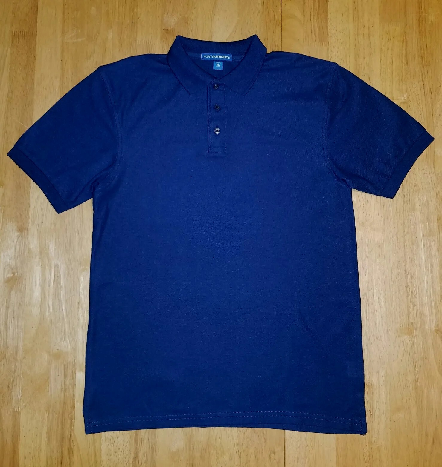 NWOT–BOYS PORT AUTHORITY NAVY BLUE POLO SHIRT–SCHOOL UNIFORMS–SIZE XL